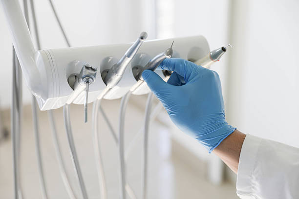 Professional Tooth Extraction technician working in Patterson, CA
